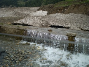 A little glacier with fast, pure and cold flodded water near Naran valley